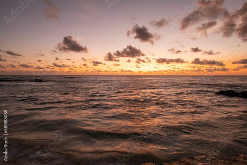 Oceanscape during the sunset with waves and rock  Ascension island