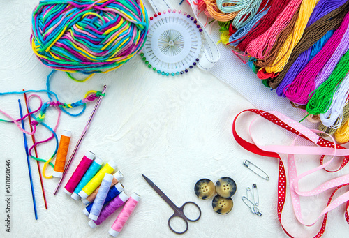 Threads and accessories for sewing and knitting. Selective focus. © yanadjan
