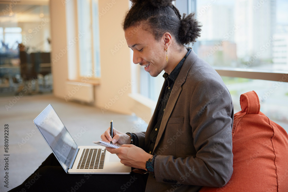 Man in office using laptop Man in office using laptop