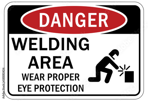 Welding hazard sign and labels welding area. Wear proper eye protection