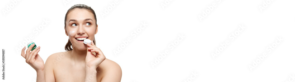 Happy beautiful young woman with smooth clean face skin posing over white background. Concept of spa, beauty, skincare, cosmetology, healthy look Happy beautiful young woman with smooth clean face skin posing over white background. Concept of spa, beauty, skincare, cosmetology, healthy look