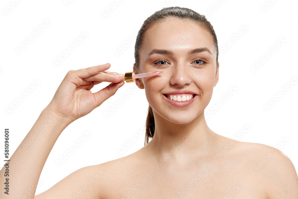 Happy beautiful young woman with smooth clean face skin posing over white background. Concept of spa, beauty, skincare, cosmetology, healthy look Happy beautiful young woman with smooth clean face skin posing over white background. Concept of spa, beauty, skincare, cosmetology, healthy look