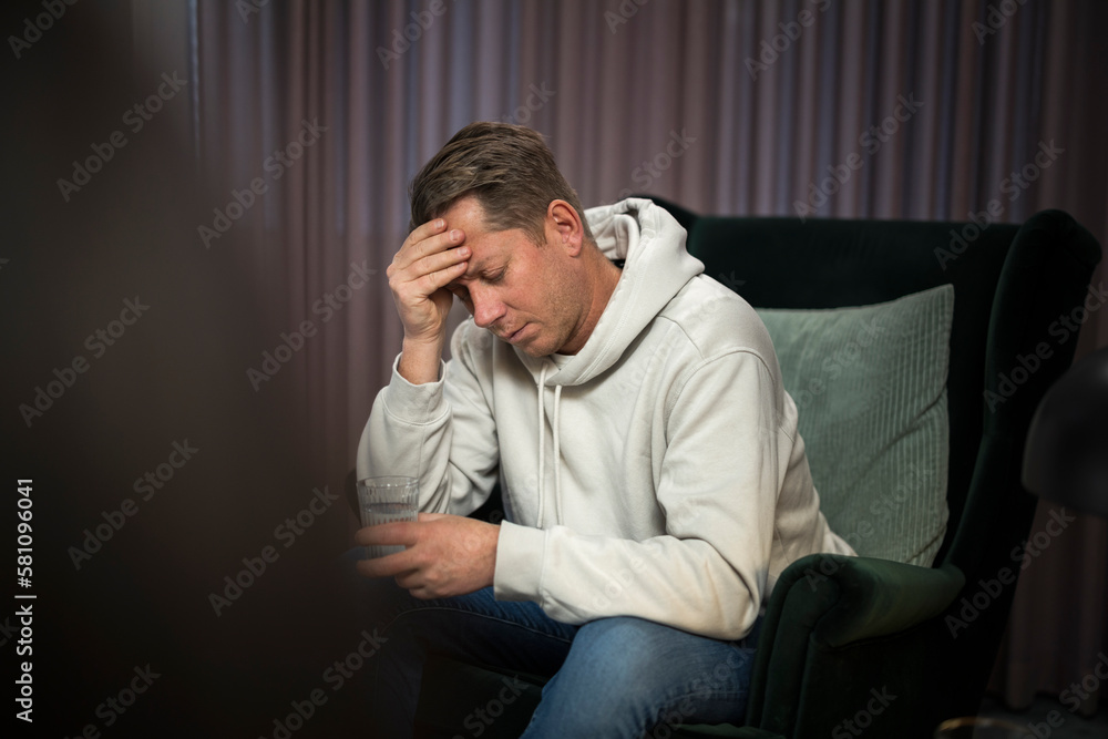 Man sitting in armchair at therapy session