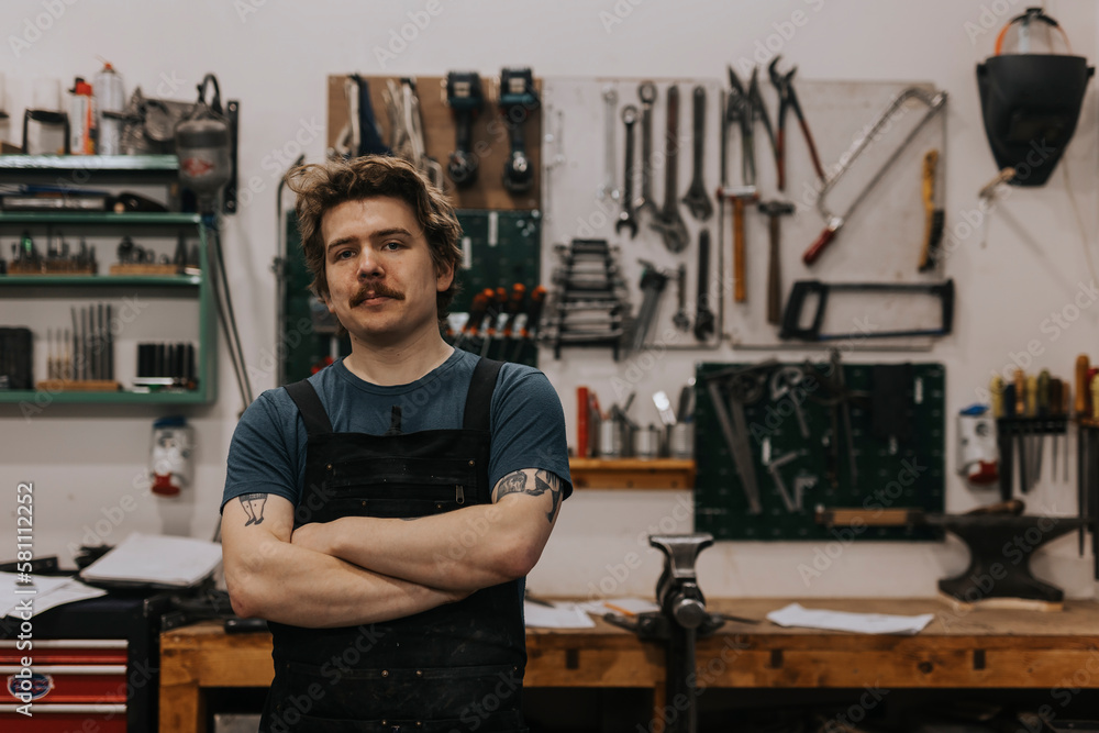 Portrait of blacksmith in workshop Portrait of blacksmith in workshop
