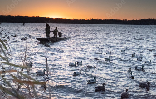 Early morning duck hunting on Reelfoot Lake, TN photo