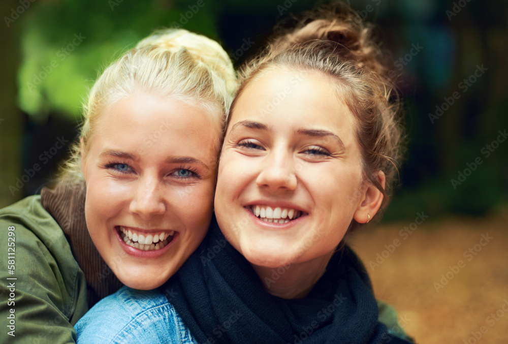 Carefree at the festival. Portrait of two young women having a good time at an outdoor festival. Carefree at the festival. Portrait of two young women having a good time at an outdoor festival.