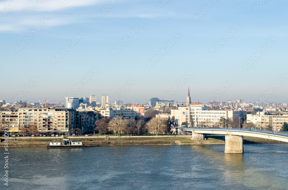 Novi Sad, Serbia. January 15, 2023. The walls of the Petrovaradin fortress in winter without snow. A panoramic view of the city of Novi Sad from the Petrovaradin fortress on a sunny day in winter.