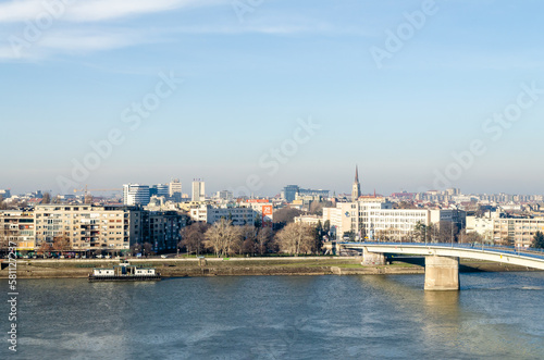 Novi Sad, Serbia. January 15, 2023. The walls of the Petrovaradin fortress in winter without snow. A panoramic view of the city of Novi Sad from the Petrovaradin fortress on a sunny day in winter. © caocao191