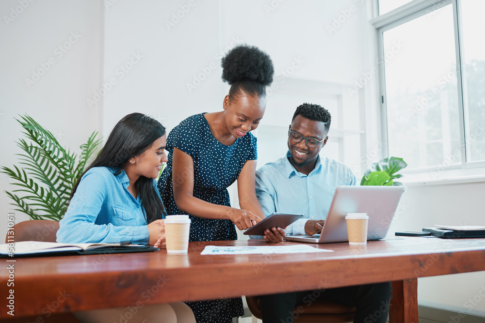 Black woman stands and shows colleagues report on digital tablet Black woman stands and shows colleagues report on digital tablet