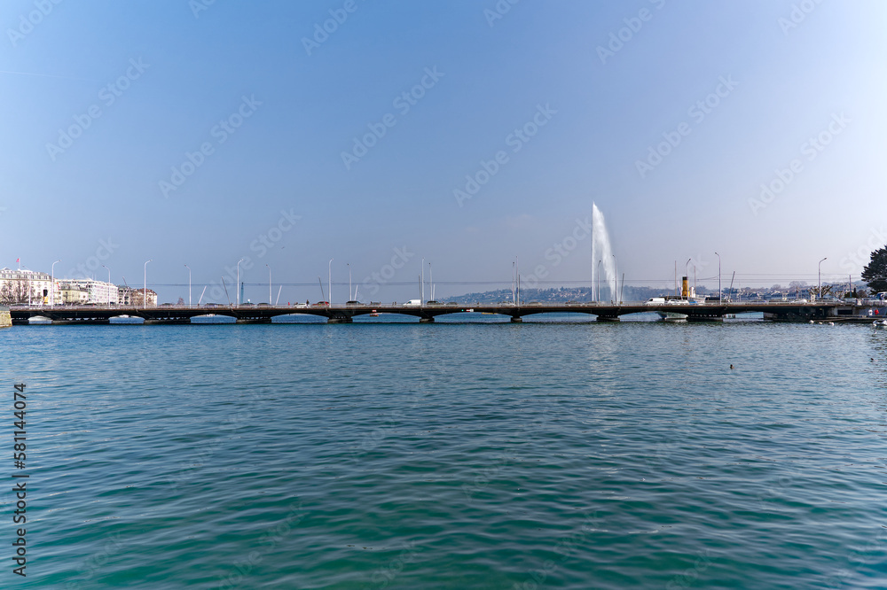 Rhone river with Mont Blanc Bridge and Lake Geneva in the background at Swiss City of Geneva on a sunny late winter day. Photo taken March 5th, 2023, Geneva, Switzerland. Rhone river with Mont Blanc Bridge and Lake Geneva in the background at Swiss City of Geneva on a sunny late winter day. Photo taken March 5th, 2023, Geneva, Switzerland.