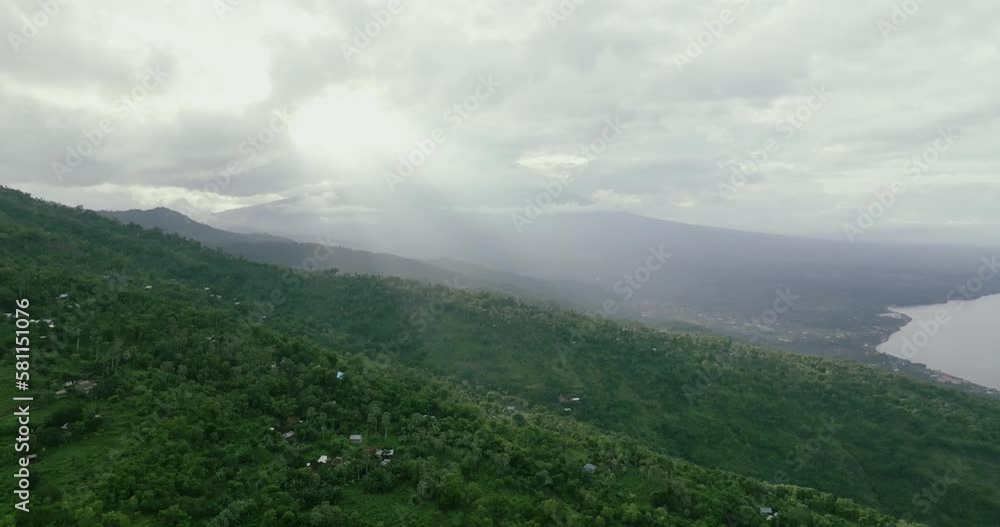 Foggy landscape tropical rain forest jungle island Bali on background majestic Foggy landscape tropical rain forest jungle island Bali on background majestic