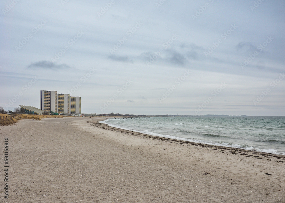 Fehmarn beach on the baltic sea with Hotels in the background in the low season