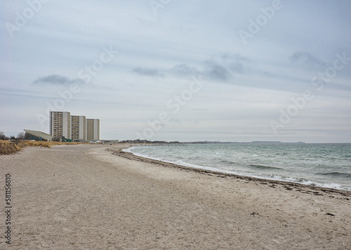 Fehmarn beach on the baltic sea with Hotels in the background in the low season