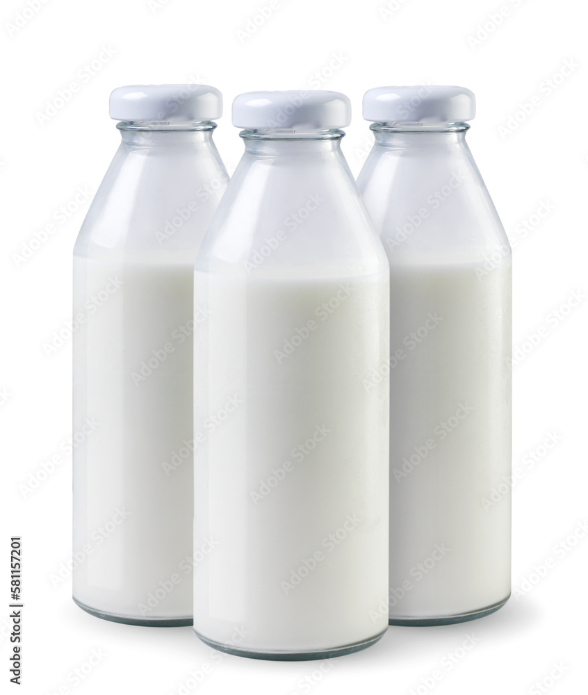 Milk in bottles on a white background. Isolated Milk in bottles on a white background. Isolated