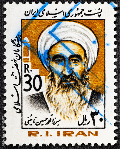 IRAN - CIRCA 1983: A stamp printed in Iran shows Ayatollah Mirza Mohammad Hossein Naiyni 1860-1936 , series religious and political figures. photo