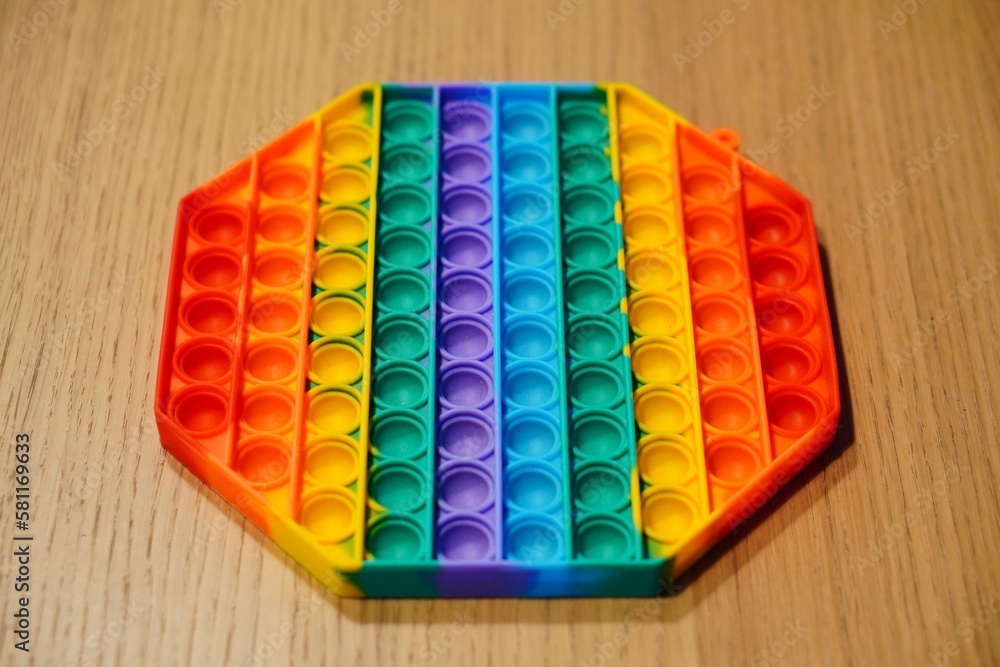 a close up of some colorful blocks on a table a close up of some colorful blocks on a table