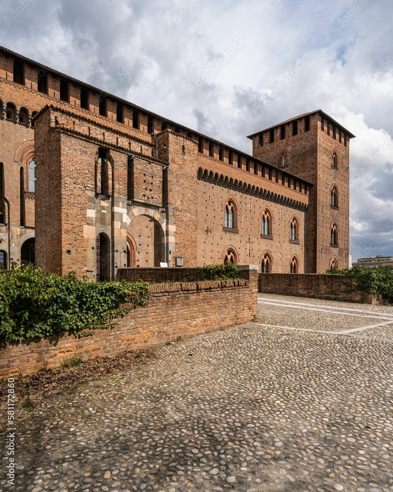 Exterior of  Visconti Castle of Pavia (Castello Visconteo di Pavia in Italian) under cloudy sky