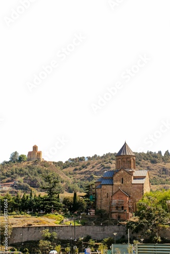 Vertical shot of the Metekhi St. Virgin church on the hill in Tbilisi  Georgia