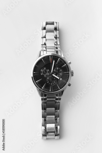 Men's wrist watch on a white background top view.