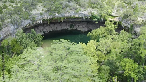 Aerial view of Hamilton Pool landscape during spring season in Texas Hill country nature preserve - 4K Drone