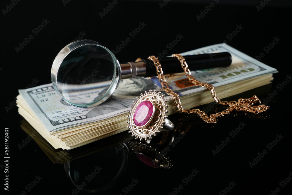 many golden and silver jewerly and money USA dollars stack, pawnshop concept, jewerly shop concept, closeup many golden and silver jewerly and money USA dollars stack, pawnshop concept, jewerly shop concept, closeup