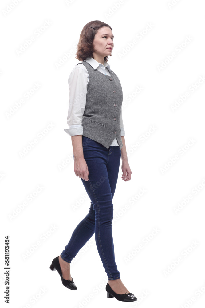 Mature woman in casual clothes walking forward. Mature woman in casual clothes walking forward.