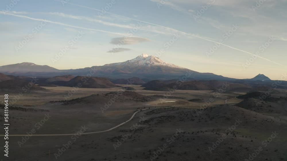 Aerial view of Mount Shasta in Northern California landscape during sunset - 4K Drone Aerial view of Mount Shasta in Northern California landscape during sunset - 4K Drone
