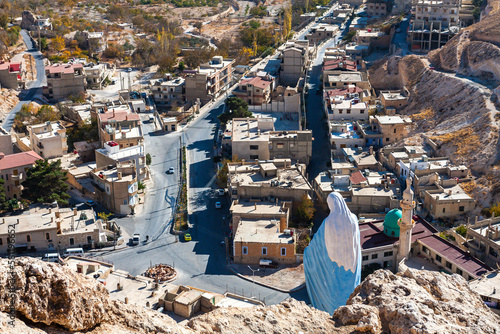 Photography Village Maaloula in Syria with a statue of the Virgin Mary Syria before the war