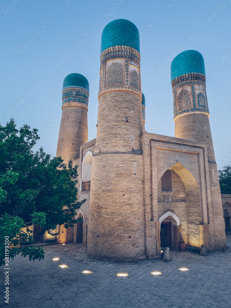Persian architecture at the Silk Road in Bukhara, Uzbekistan: Char-Minar mosque and madrasah.