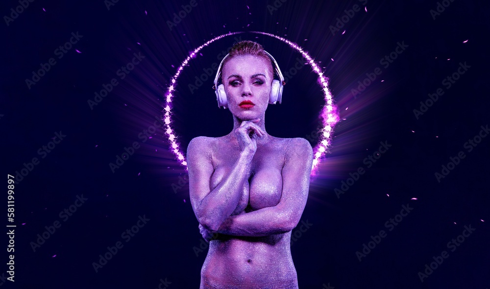 Hot woman DJ in neon lights. Portrait of sexy TDJ at club party.