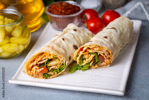 фотографія Pita bread lavash roll chicken doner kebab and fresh vegetables - Durum Chicken