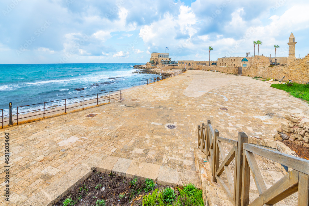 The ancient port and arena with Roman Ruins along the Mediterranean Sea at Caesarea Maritima National Park in Caesarea, Israel.	