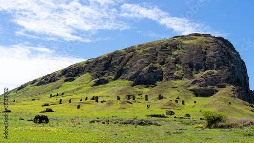 Outer slope of the Rano Raraku on Easter Island (Rapa Nui), Chile. Rano Raraku is commonly known as the “Moai Factory” with hundreds of abandoned statues scattered around. photo