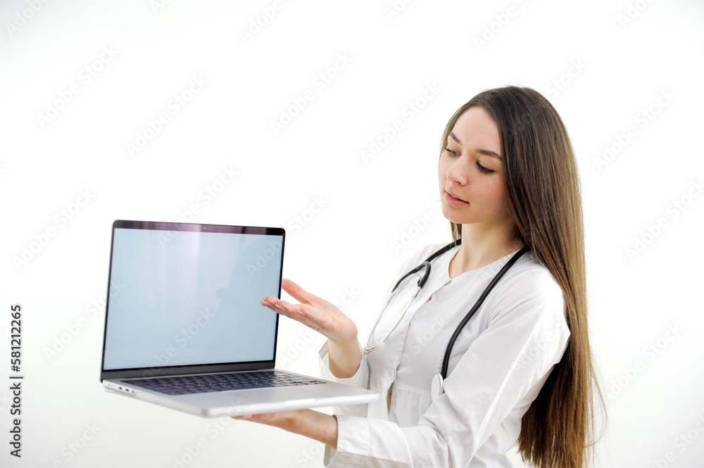 Doctor or nurse hold laptop computer in hands finger pointing digital screen isolated on a white background. High quality photo Doctor or nurse hold laptop computer in hands finger pointing digital screen isolated on a white background. High quality photo