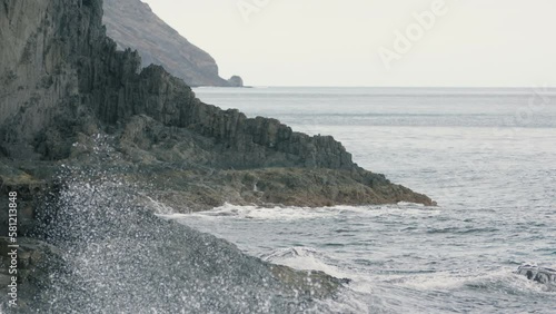 Rocky shore in the ocean. photo