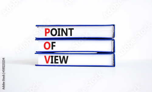 POV point of view symbol. Concept words POV point of view on books on a beautiful white table white background. Business and POV point of view concept. Copy space.