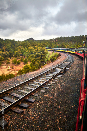 train in the forest in foggy day, chepe train in chihuahua photo
