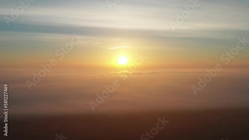 Beautiful landscape with morning fog over the forest in Poland photo