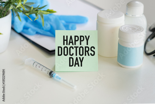 Happy Doctors Day. Greeting Card. Close-up, view from above, nobody. Concept of preparation for a professional holidays.