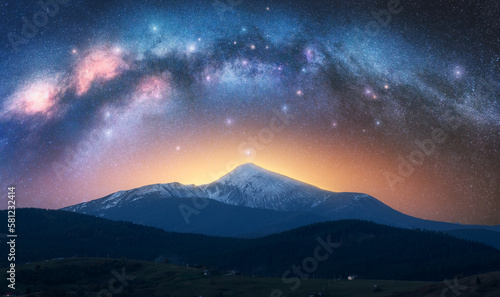Arched Milky Way over the beautiful mountains at starry night