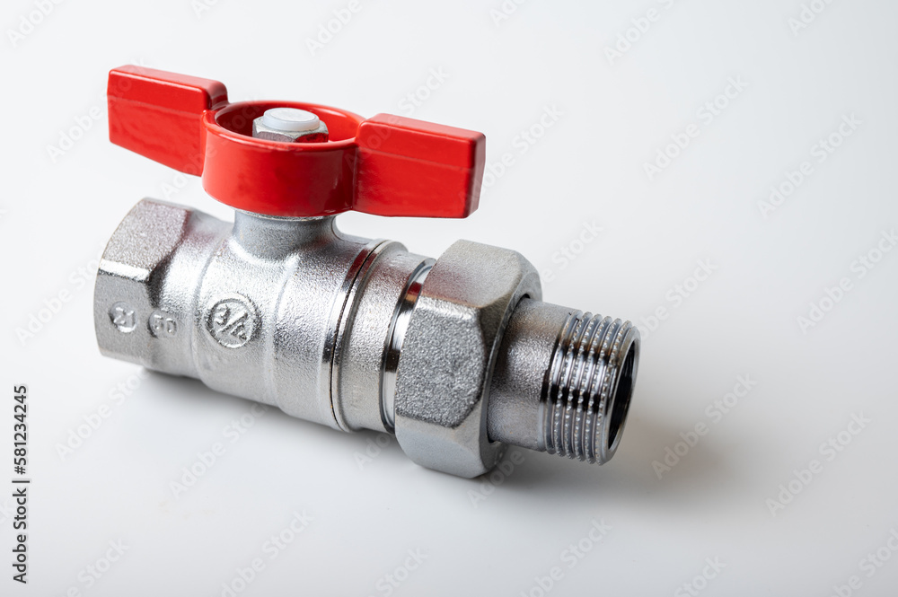 close up view, brass metal water faucet with red valve, different angle isolated on light background, plumbing connection close up view, brass metal water faucet with red valve, different angle isolated on light background, plumbing connection