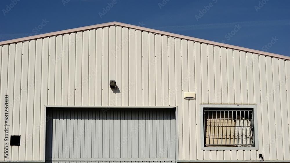 industrial warehouse building facade against the sky industrial warehouse building facade against the sky