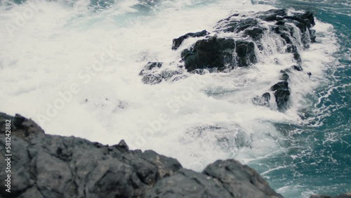 Rocky shore in the ocean. photo