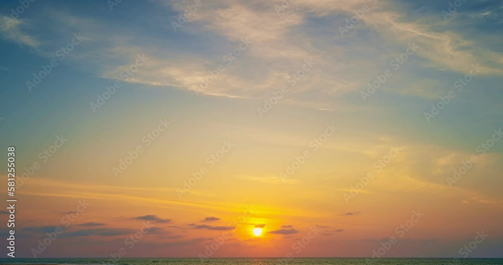 Time lapse of Majestic sunset or sunrise over sea landscape,Amazing light of nature cloudscape sky and Clouds moving away rolling, Colorful sunset light dramatic clouds in golden hour Footage Time lapse of Majestic sunset or sunrise over sea landscape,Amazing light of nature cloudscape sky and Clouds moving away rolling, Colorful sunset light dramatic clouds in golden hour Footage
