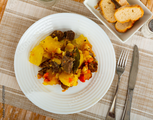 Portion of homemade stewed veal with potato and carrot