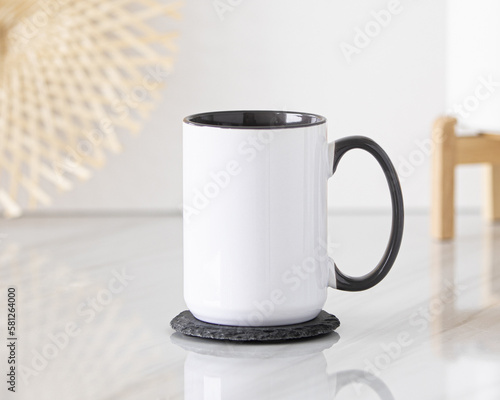 Blank black handle mug mockup photo, black rim mug on the table 