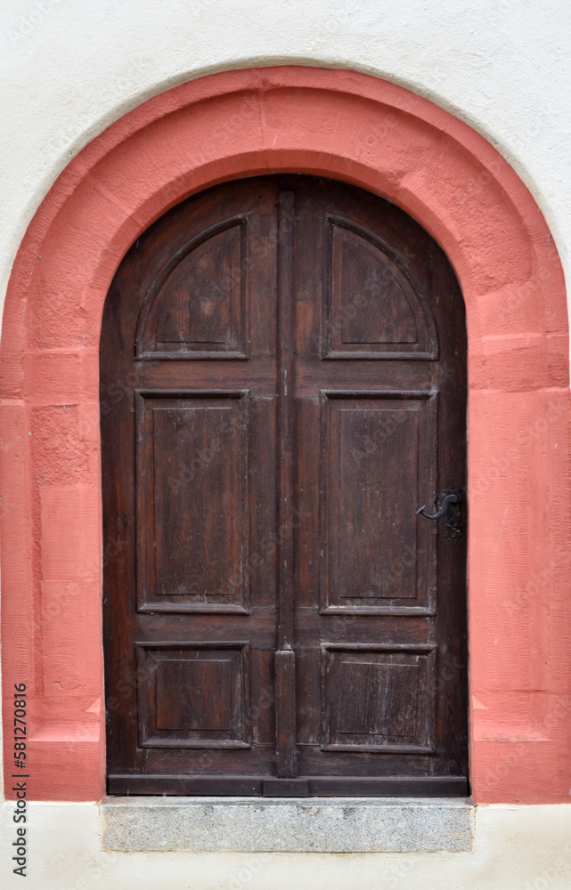 View of old building with wooden door View of old building with wooden door
