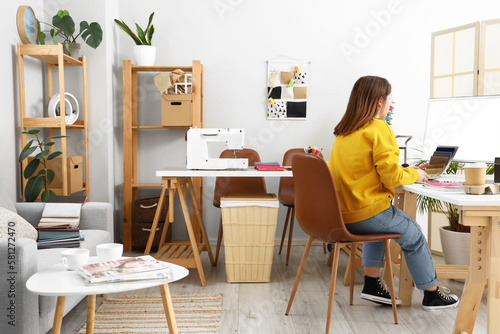 Female tailor working at ta...