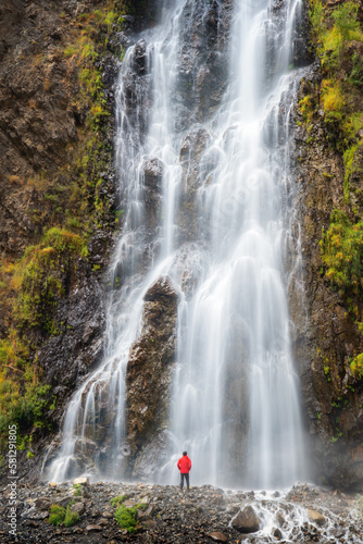 Mantoka Waterfall in Karakoram high mountain hills. Nature landscape background, Skardu-Gilgit, Pakistan. Travel on holiday vacation. photo