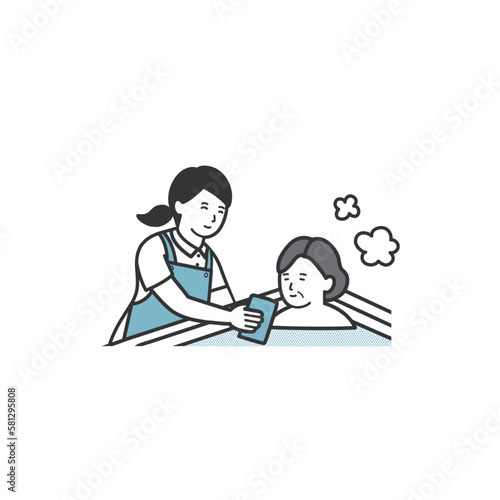 入浴する高齢者と介助する介護士のイラスト